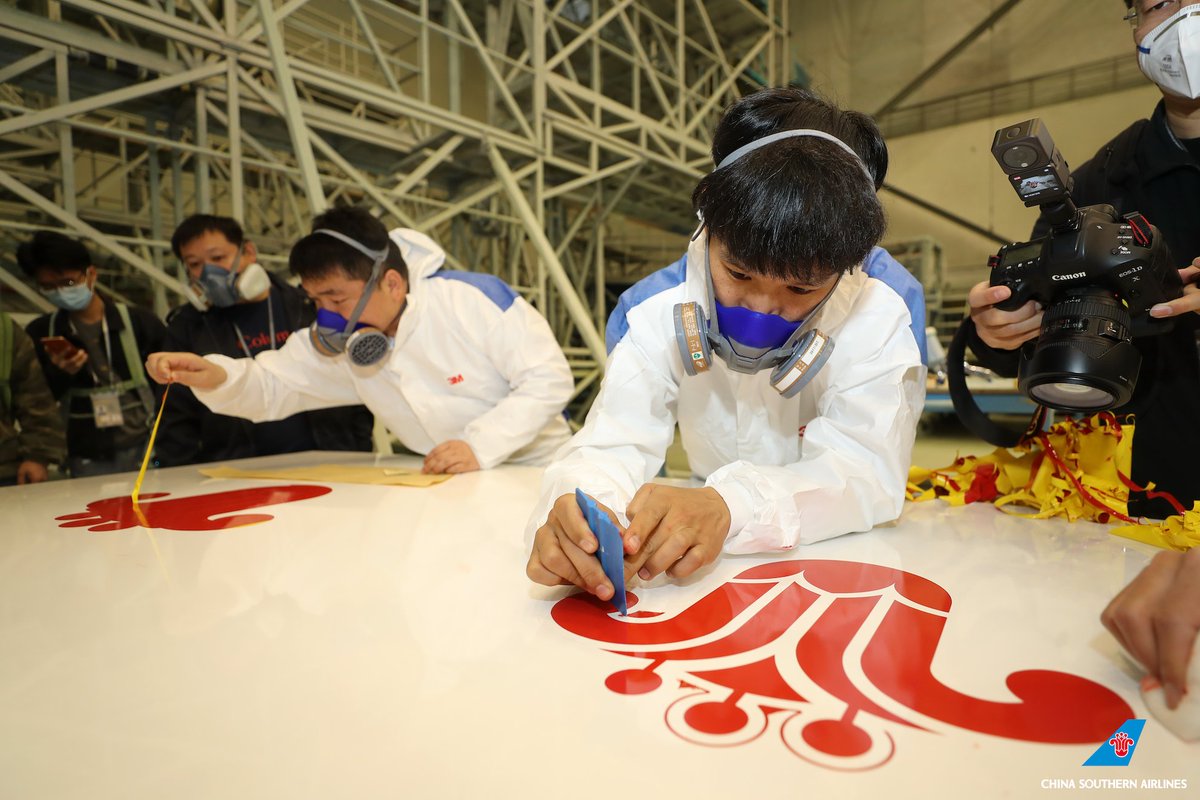 CSAIRGlobal's tweet photo. As Shanghai Shisai puts on its coat in the #CSAir #GAMECO hangar, let us witness the painting process alongside the car painting gold medal winners of the World Skills Competition. Best wishes for the December 16th maiden flight.
#FlyWithCsair https://t.co/LlpHoYDDag
