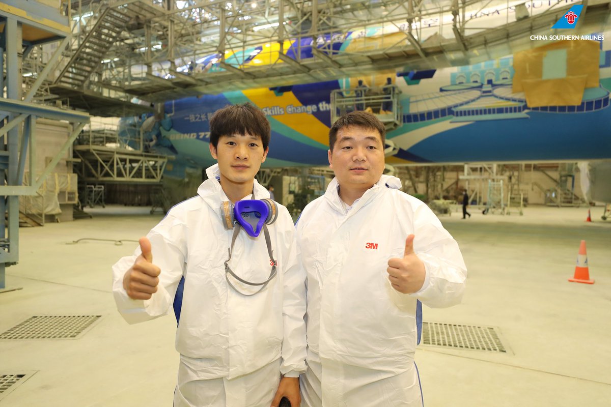 CSAIRGlobal's tweet photo. As Shanghai Shisai puts on its coat in the #CSAir #GAMECO hangar, let us witness the painting process alongside the car painting gold medal winners of the World Skills Competition. Best wishes for the December 16th maiden flight.
#FlyWithCsair https://t.co/LlpHoYDDag