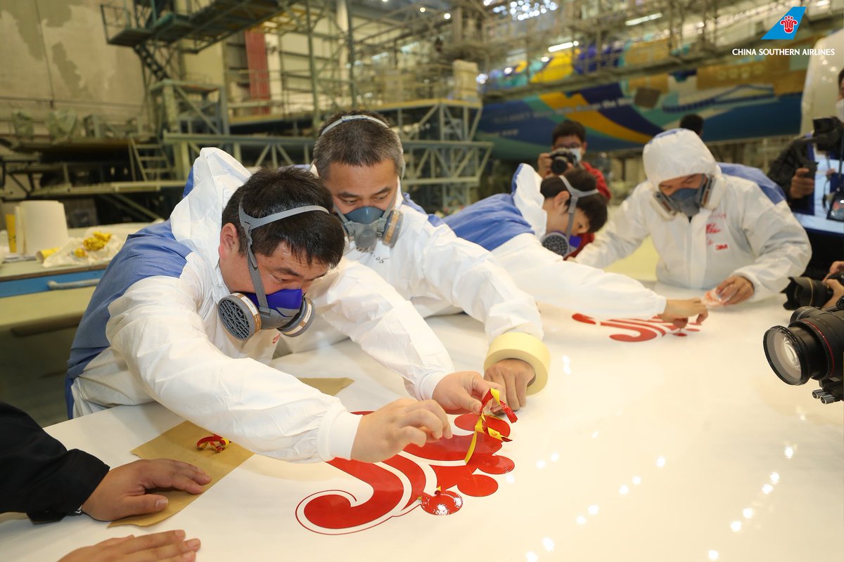 CSAIRGlobal's tweet photo. As Shanghai Shisai puts on its coat in the #CSAir #GAMECO hangar, let us witness the painting process alongside the car painting gold medal winners of the World Skills Competition. Best wishes for the December 16th maiden flight.
#FlyWithCsair https://t.co/LlpHoYDDag
