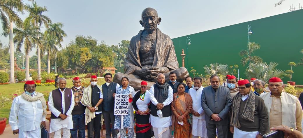 INCIndia's tweet photo. LoP (RS) Shri @kharge along with the MPs &amp; leaders of the Congress and other like-minded Opposition parties observe silence on the sudden and sad demise of Chief of Defence Staff, General Bipin Rawat, his wife Madhulika Rawat, and other personnel in a helicopter crash. https://t.co/WOMJRaX5ge