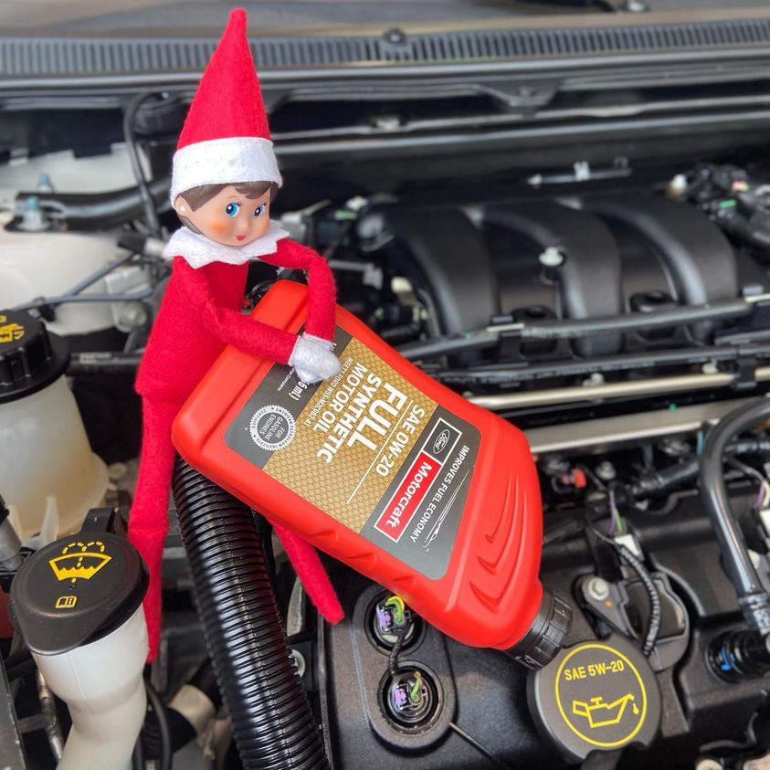 HoffmanFord's tweet photo. Our Sales team caught our Elf friend attempting to perform maintenance on her vehicle. It looks like she isn’t the best reader, she was putting the wrong type of engine oil in this motor! Make sure to use your Service Experts at Hoffman Ford for all your questions!  #HoffmanHasIt https://t.co/71aql8HoK6