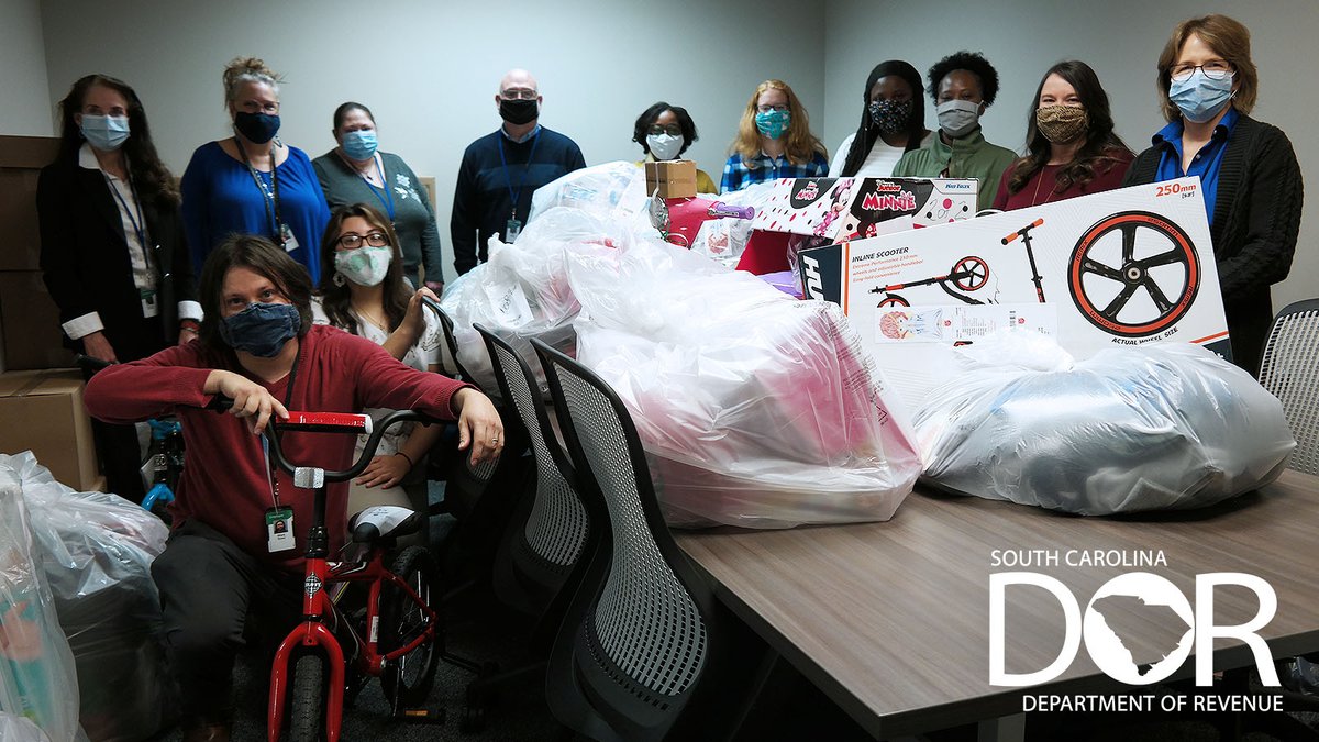theSCDOR's tweet photo. 🎁🚲🧥 #teamSCDOR is making the holidays brighter for children across South Carolina. This month, our agency collected gifts and clothes for 63 kids as part of the Angel Tree program.

📸 Here's our Columbia office in action! Find your place on our team at https://t.co/H00TRKRrI8 https://t.co/3SDrmgLHeM