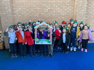 BirchwoodCE's tweet photo. Its Elfie Selfie time! Year 1 are heading out for the elf run this morning in aid of St Rocco's on our amazing daily mile track. #bcepsyear1 #bcepspe @StRoccos https://t.co/U728CYkeCn