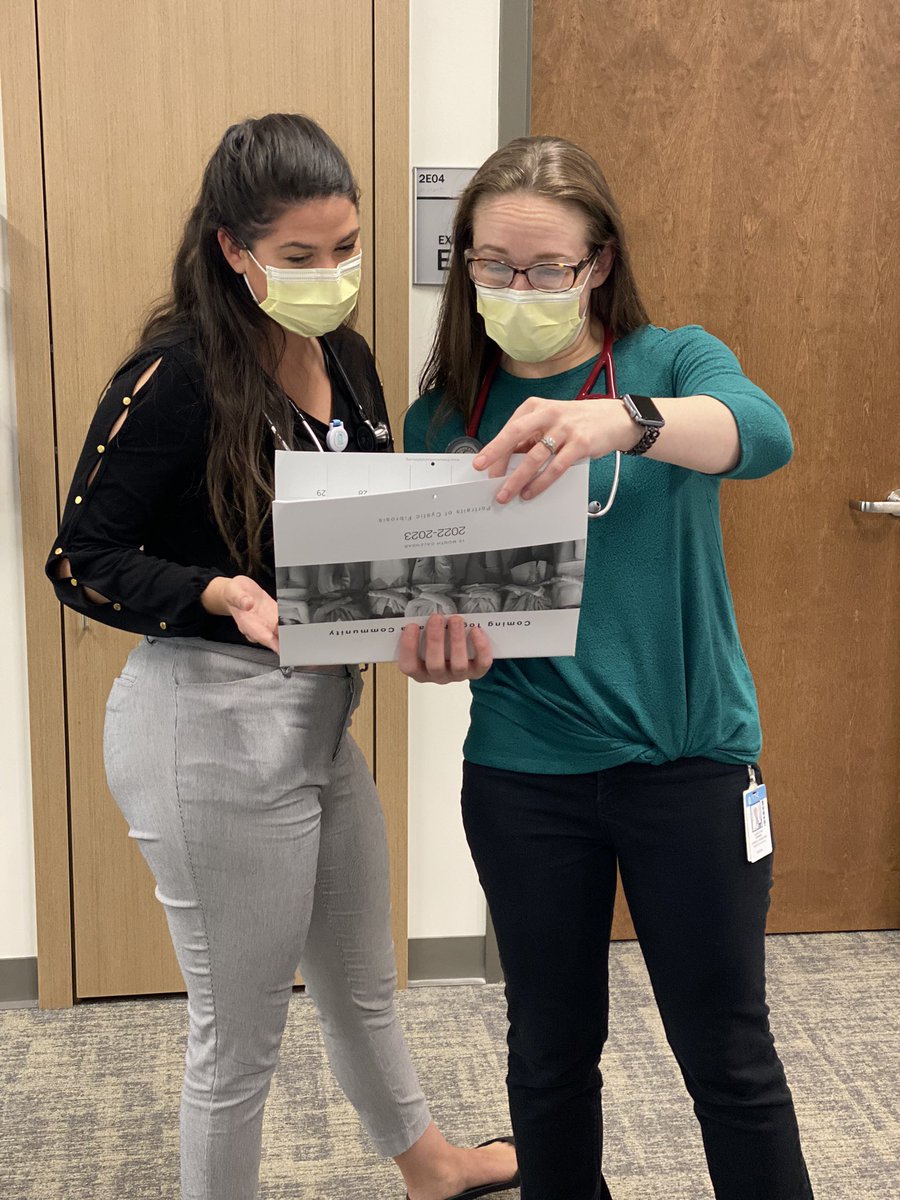 Dr. Leigh Anne Daniels showing off the 2022 CF calendar in clinic, while imparting some -excellent- teaching regarding airway clearance