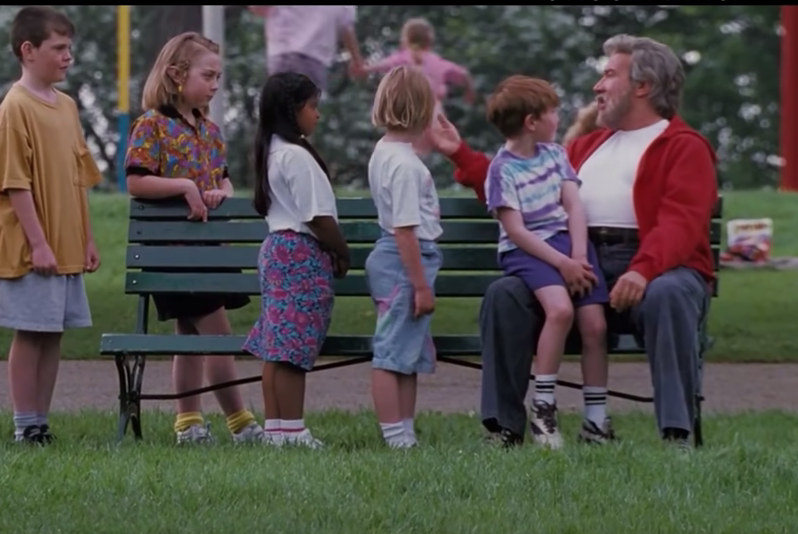 wordsfromandrew's tweet photo. So my wife and I were watching the #TheSantaClause, and we noticed something neither of us had before. The girl, standing behind the bench, second from the left is an elf. Which got us thinking, how many elfs are there hiding in plain sight? #Christmas  #ELF #ElfConspiracy https://t.co/7byzmxwtWB