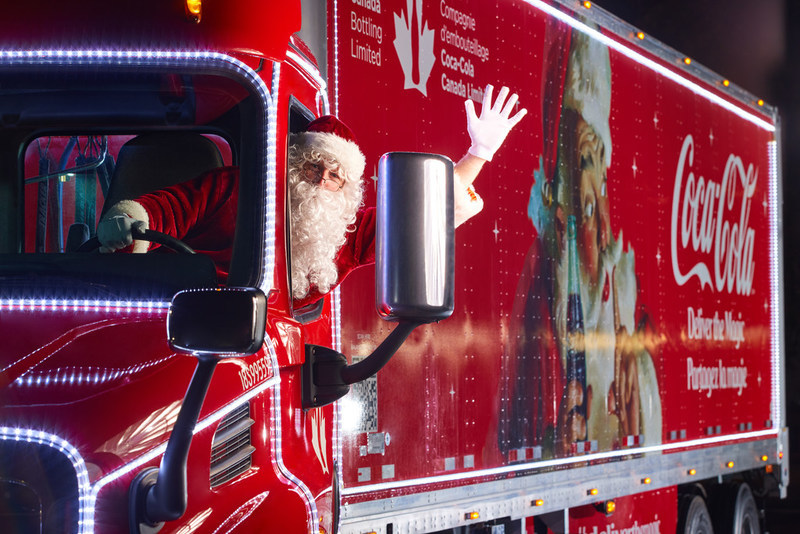 Todaystrucking's tweet photo. Reindeer are passe. This year, Santa is travelling by Freightliner. Read about the first Canadian tour of @CocaCola's famous Christmas truck -- and the story behind the fixture in "pop" culture. https://t.co/BXYtD3n4lj #deliverthemagic @CocaColaCo_ca https://t.co/LIwLu8eoip
