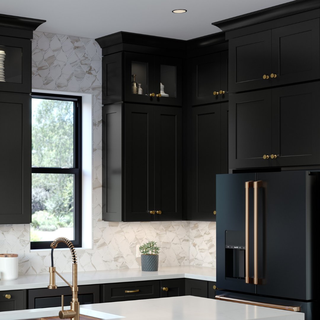 Imagine a spotless white countertop, brass faucets, and light fixtures contrast with black cabinets, black stainless steel appliances, and textured wall tiles.

spr.ly/6013JstFB

#waypointlivingspaces #kitchencabinets #kitchenremodel #kitchnedesign #cabinets #kitchen