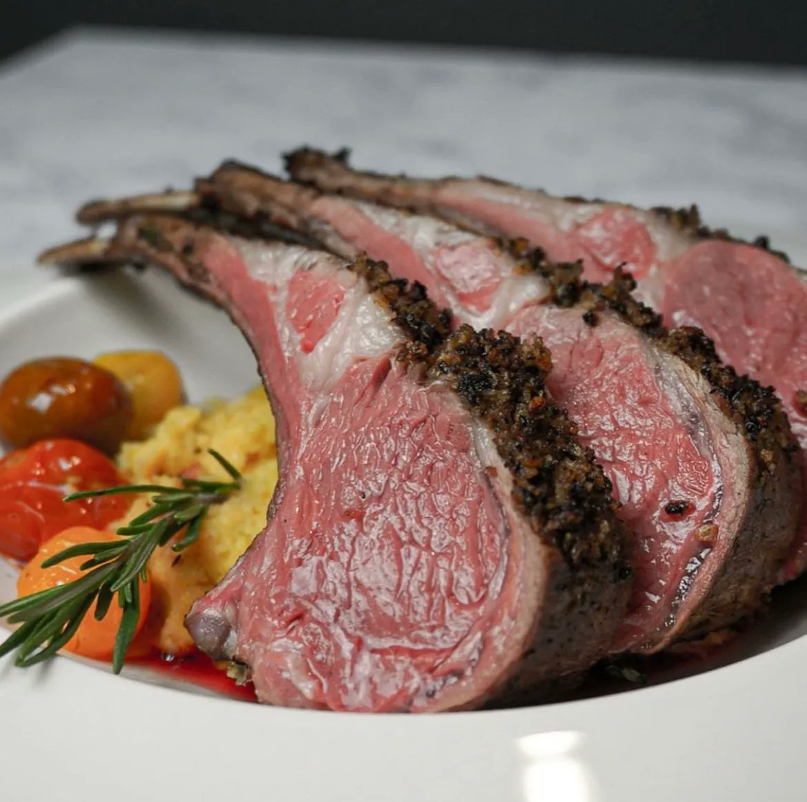 theISVA's tweet photo. Don't miss out on our live cook-along dinner tomorrow night, featuring Chef Thiago Quirino of Robusto Food House! He'll be making his black garlic and herb crusted sous vide lamb chops with creamy polenta and confit tomatoes. Sign up at https://t.co/RzKHQmwDNZ! https://t.co/OgGBBucdV4