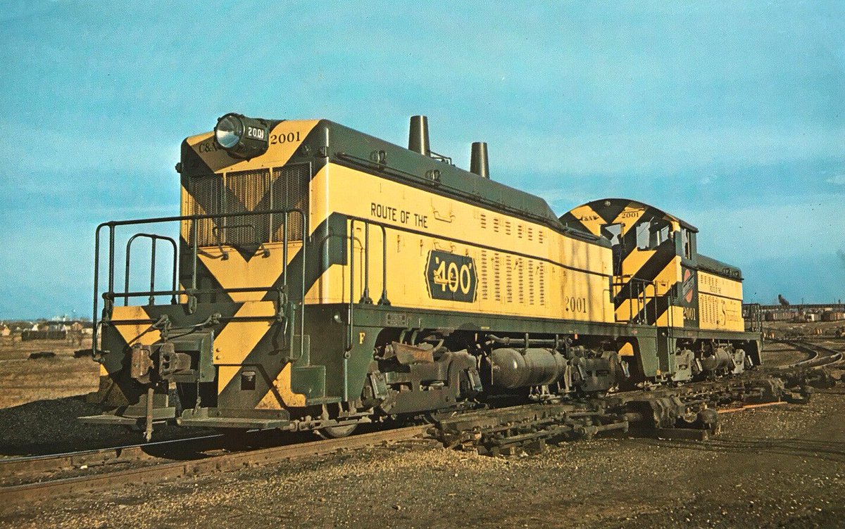 americanrails's tweet photo. Electro-Motive's "cow-calf" transfer switchers.   In this Chicago &amp; North Western photo one its 'TR-2' sets is featured, #2001-A and #2001-B, during October of 1949. As built, these locomotives were used in hump yard service in Chicago. https://t.co/J1lHFLtXt5 https://t.co/EVeYF9BDS7