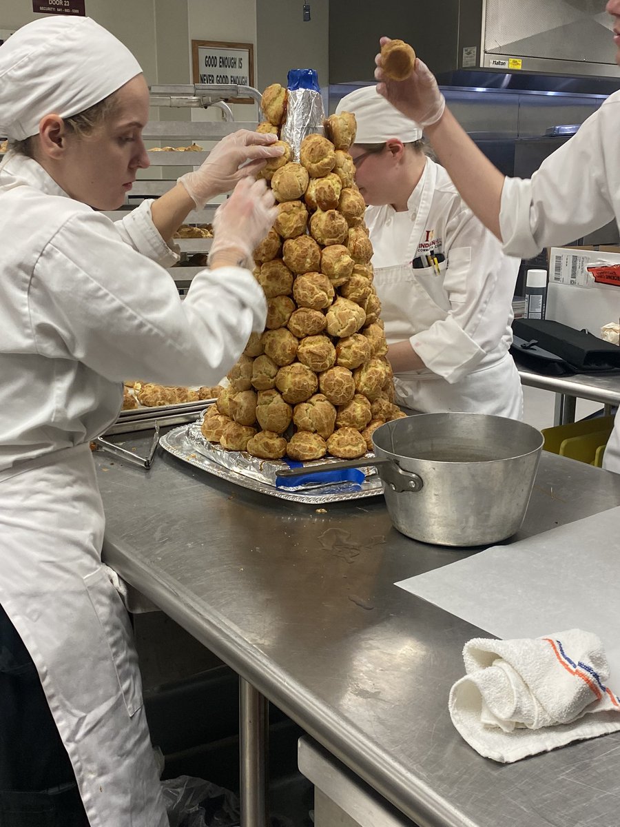 indianhills's tweet photo. IHCC Culinary Students are hard at work prepping Holiday treats, including the famous “Croquembouche”. 

Croquembouche is a French dessert consisting of pastry puffs piled into a cone and bound with threads of caramel. https://t.co/VkozYZvjBx