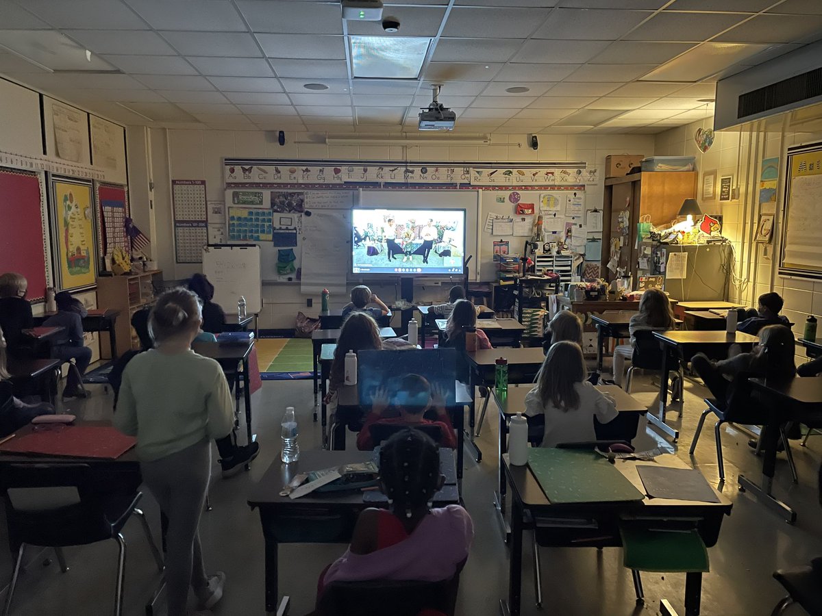 SManchak's tweet photo. 2nds watching a live performance of “The Old Lady Who Swallowed a Fly” with the American Pops Orchestra (APO) on Google Meet. They loved it!! #Theamericanpops https://t.co/8zjqqAWArB