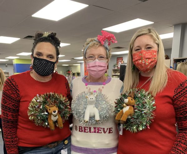 Some fun ugly sweaters for our staff contest today! #matching #holidayfun