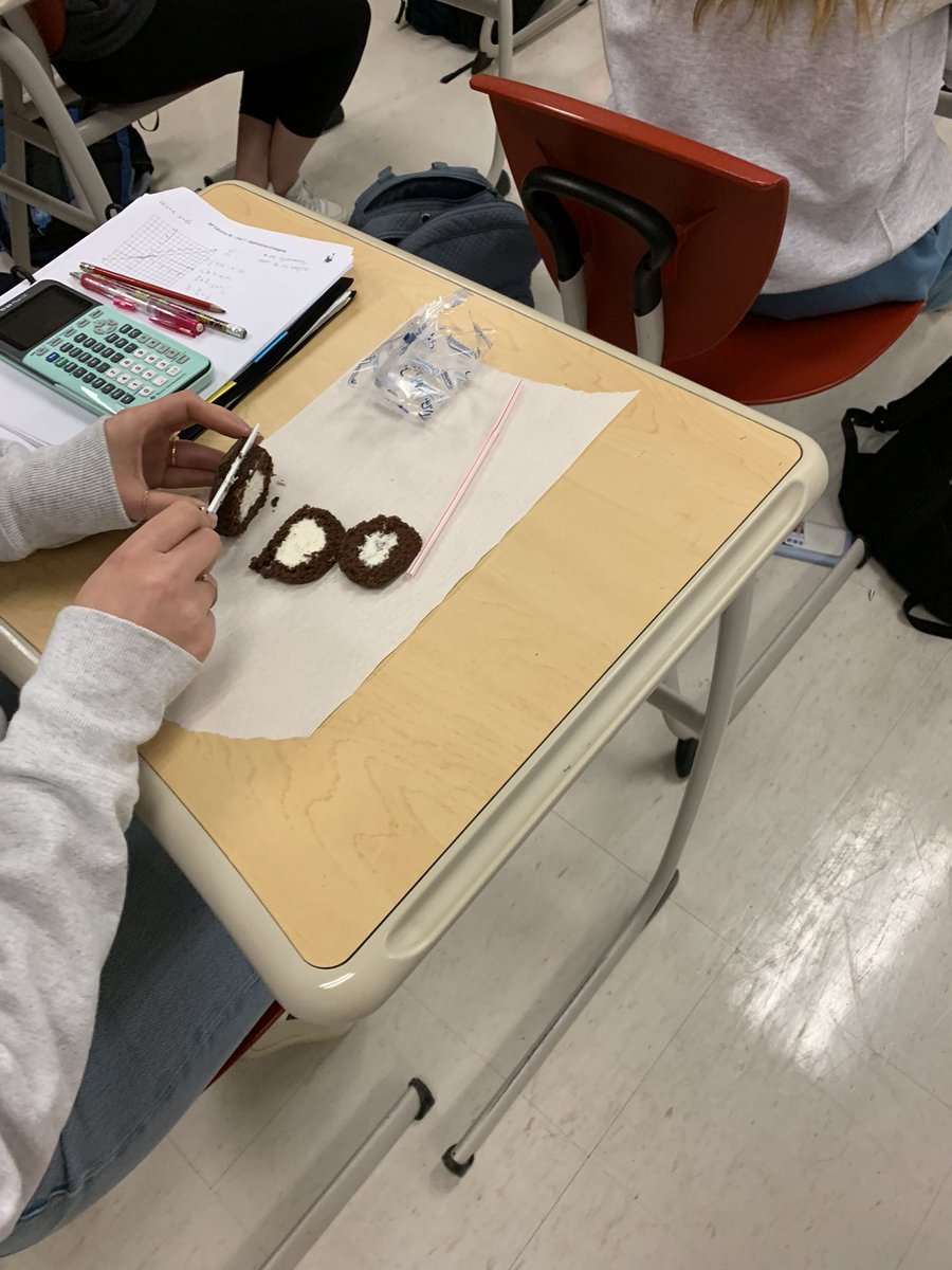 Cupcakes and calculus, doesn’t get better than that!  Using cream filled cupcake and straws  to demonstrate volume by revolution and the disc method and washer method. #MToBS #iteachmath <a href="/NCHS_CT/">NCHS</a>