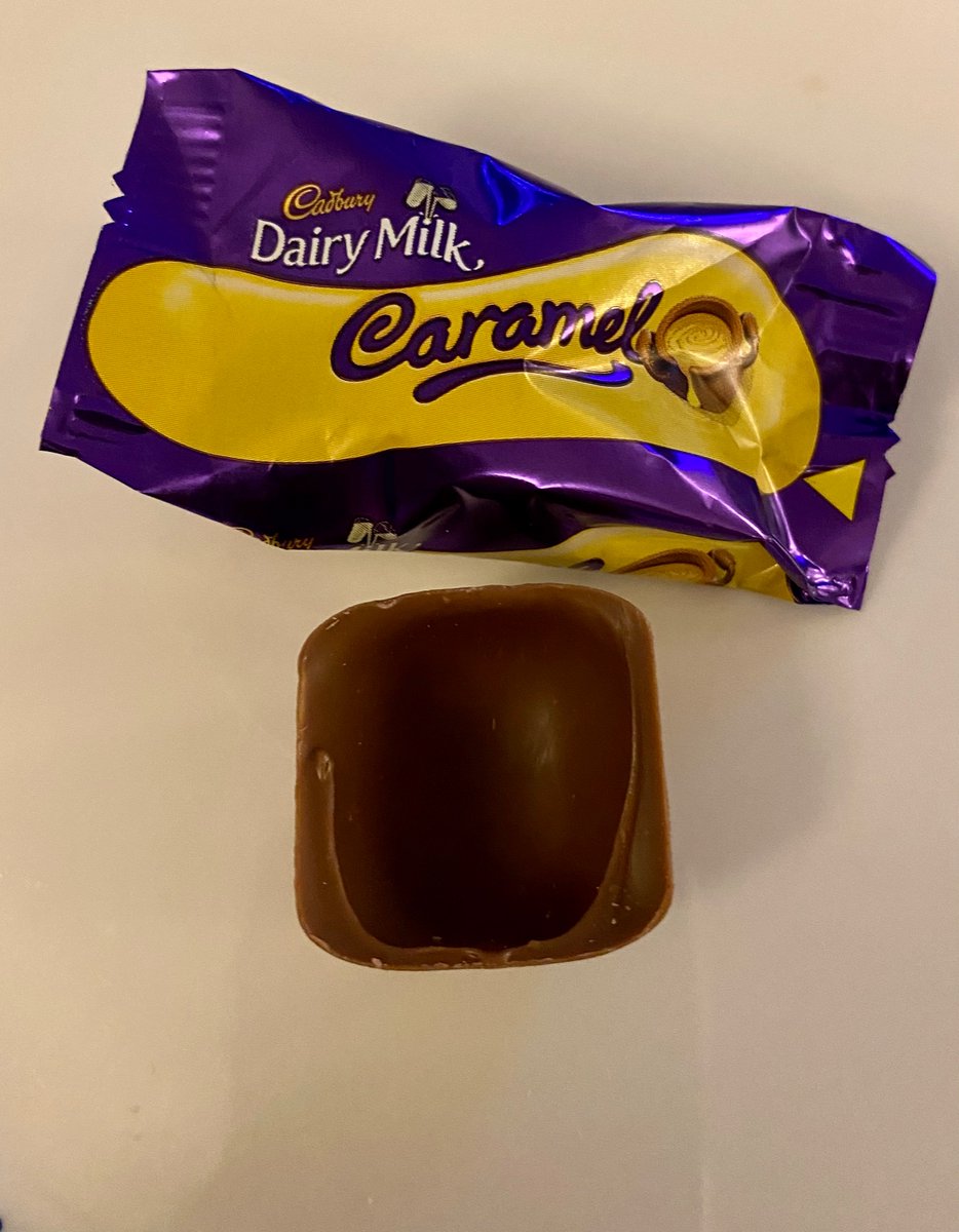 Johnfitzpat's tweet photo. Devastating start to Christmas chocolates season! A Dairy Milk Caramel with no caramel 😭 @CadburyUK https://t.co/t9FrDiauIX