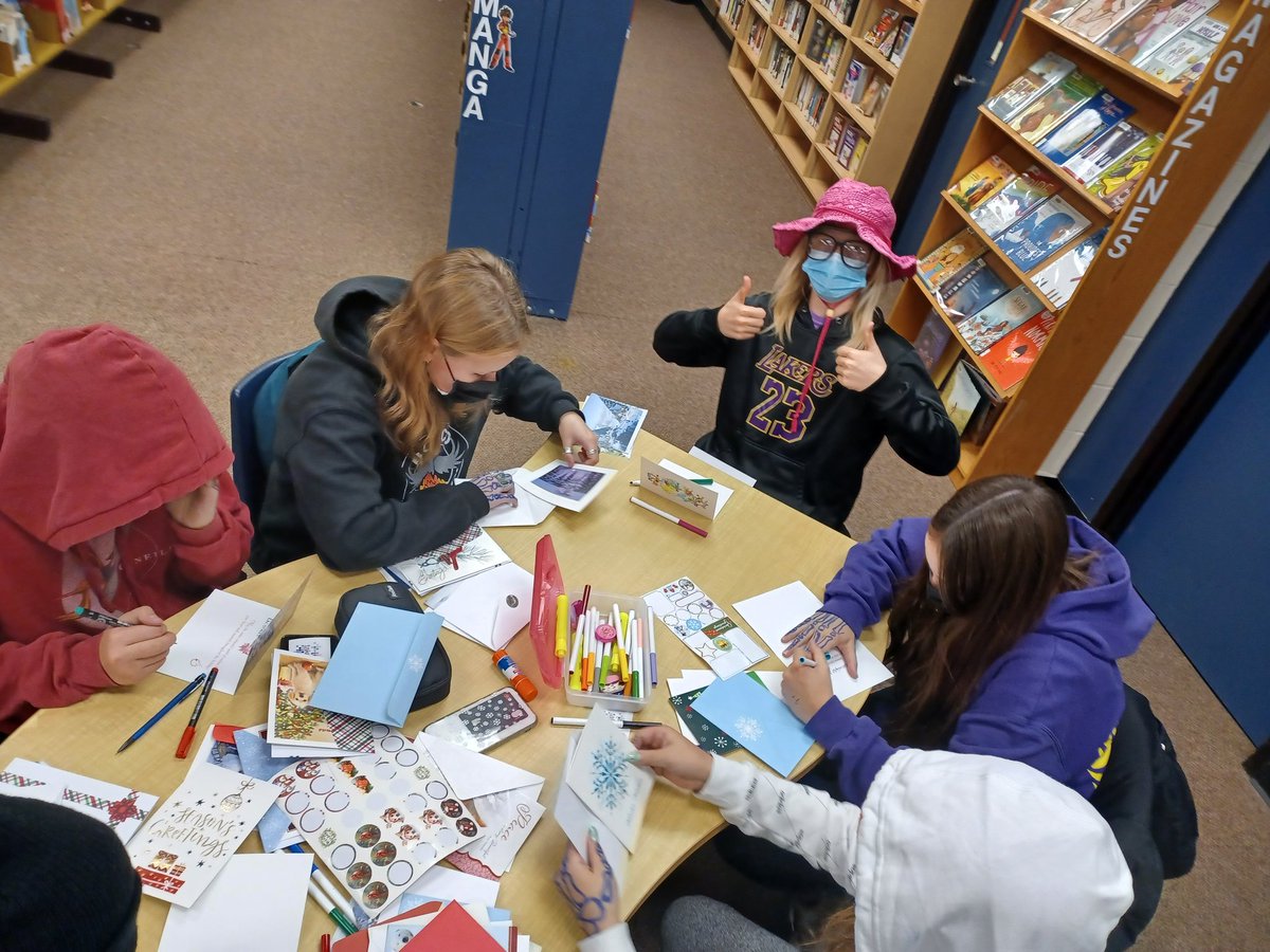 actondistrict's tweet photo. Happy holidays! Acton Volunteer Corps wrote festive greetings to our local seniors tonight. #community https://t.co/jiTdXyajBx