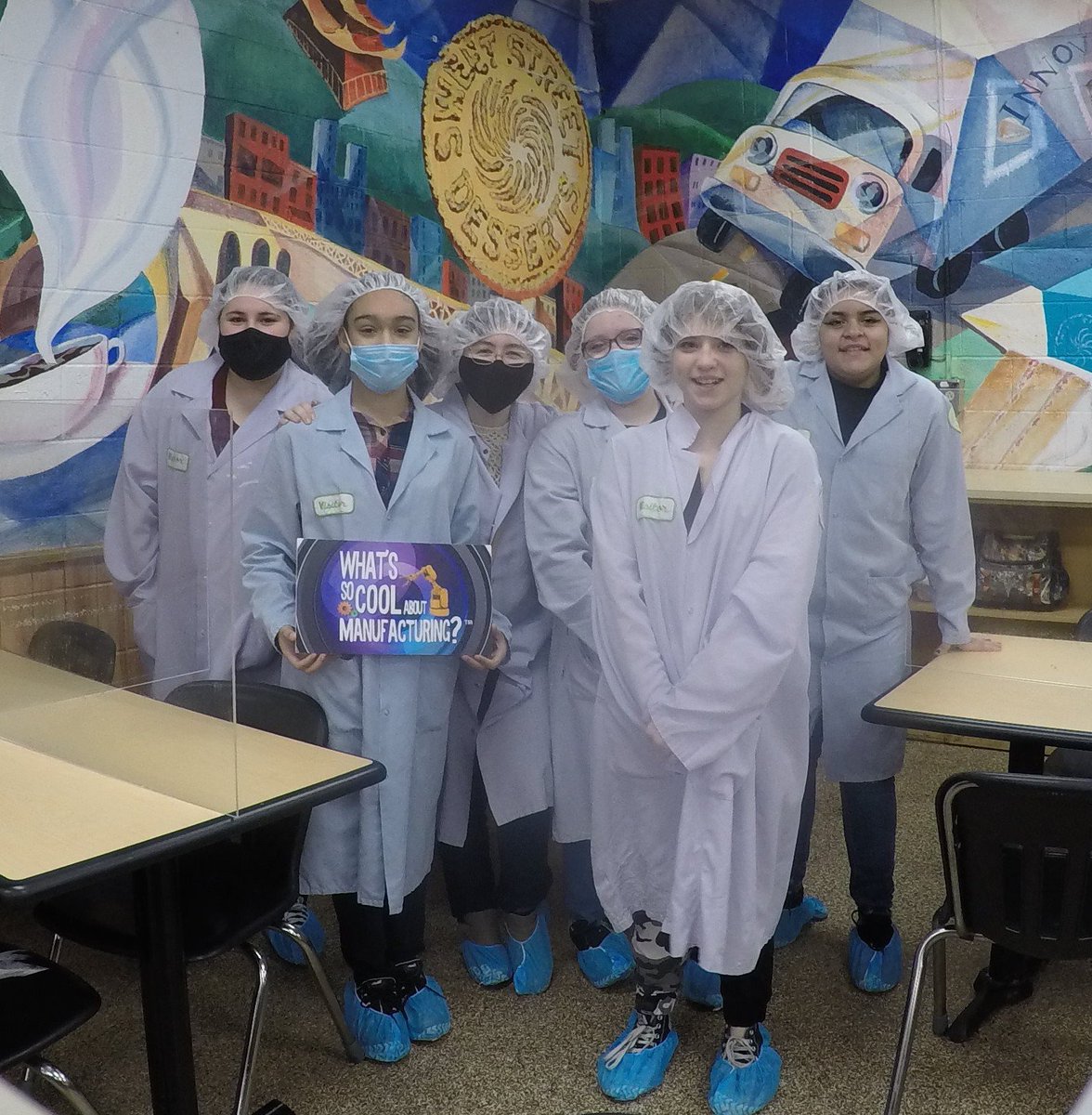 MsFrederickArt's tweet photo. This year's 'What's So Cool About Manufacturing?' contest is in full swing! Today, students at MJHS visited their featured manufacturer, Sweet Street Desserts, for an incredible video production day! 💛💙 https://t.co/cm9hnlSZHR