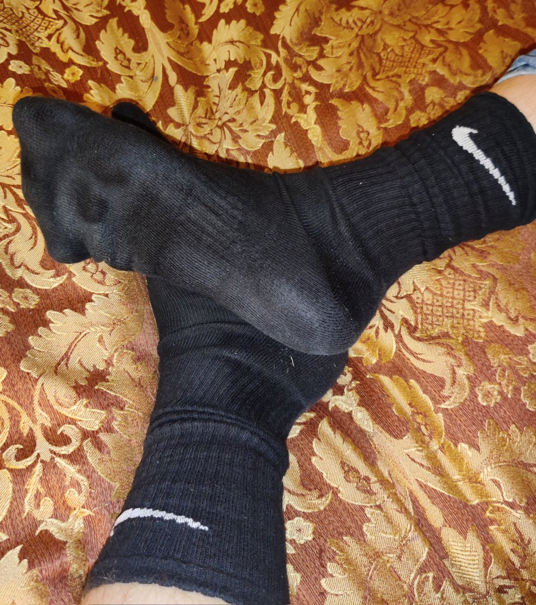 black nike socks on feet
