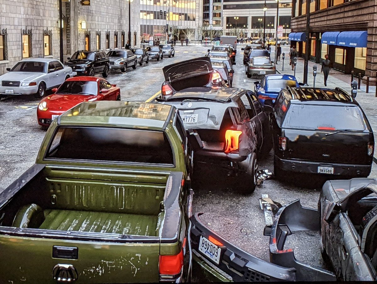 xybur's tweet photo. This #MatrixAwakens experience is #unreal (yes I know). I got into a car wreck and my jaw dropped when the vehicles dynamically took damage and warped in a convincing fashion. If it weren't for the NPCs in the pic, at a glance it could pass for real. #Matrix #MatrixResurrections https://t.co/GQJuGNV0jV