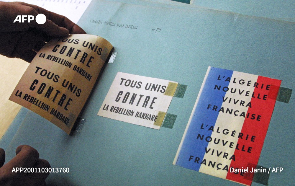 afpfr's tweet photo. La France va ouvrir "avec 15 ans d'avance" ses archives sur la guerre d'Algérie, annonce Roselyne Bachelot, ministre de la Culture, sur BFMTV #AFP https://t.co/9zMq6Mm4VW