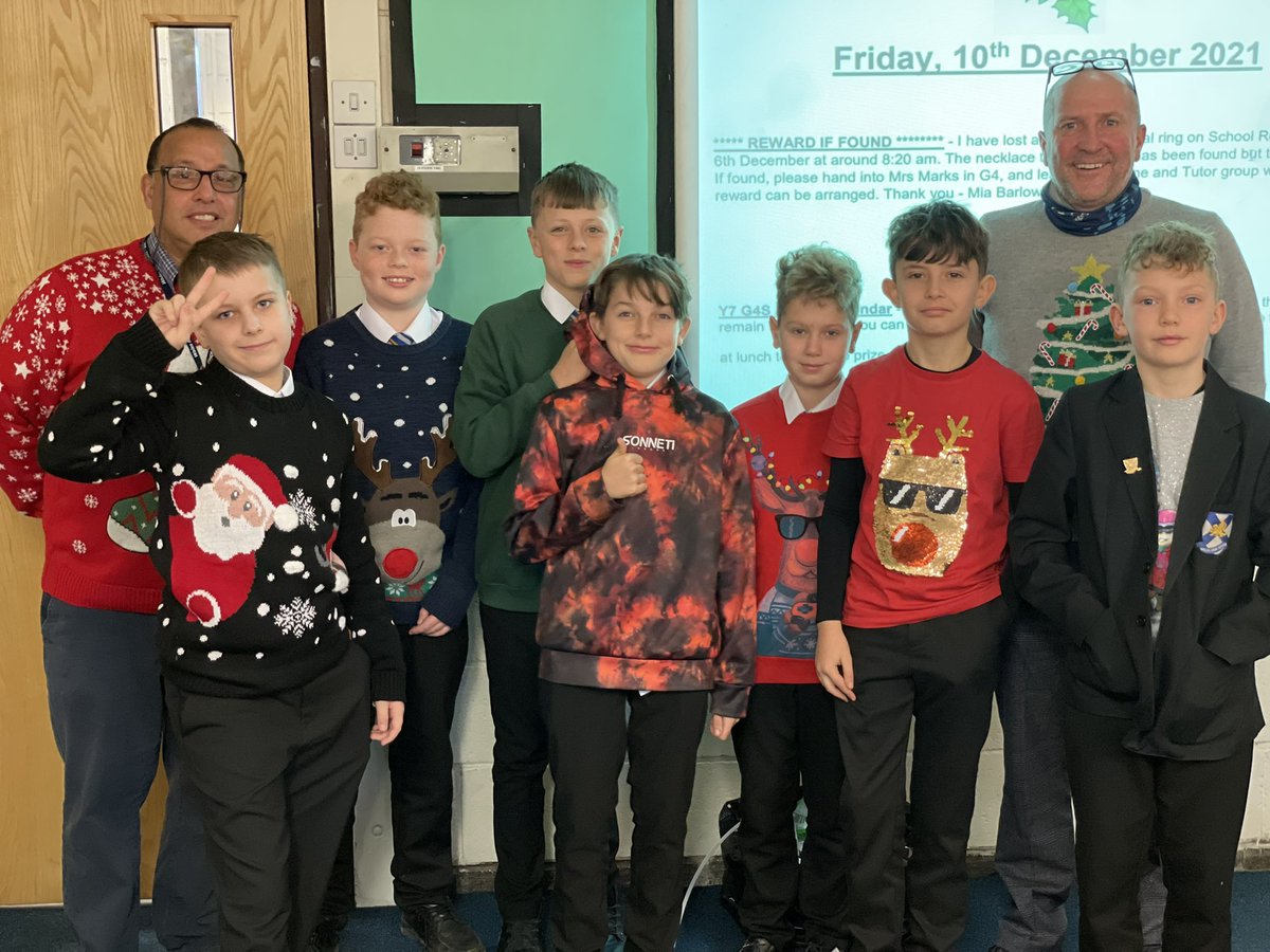 WalesHigh's tweet photo. Christmas jumpers in the Maths department! Mr Evans and Mr Bradley in matching jumpers 🥰 #christmasjumperday https://t.co/QhXf3pgOa2
