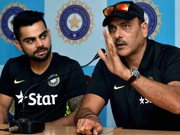 FreeLIV_me's tweet photo. Over the years, #RaviShastri and #ViratKohli have had a brilliant cricket relationship. It is said that #Shastri’s appointment as the head coach of the Indian team in 2017 is #Kohli  ’s wish.#BCCI #ShameOnYouBCCI #IndianCricketTeam #ShameOnBCCI https://t.co/CWNlWLDkGx