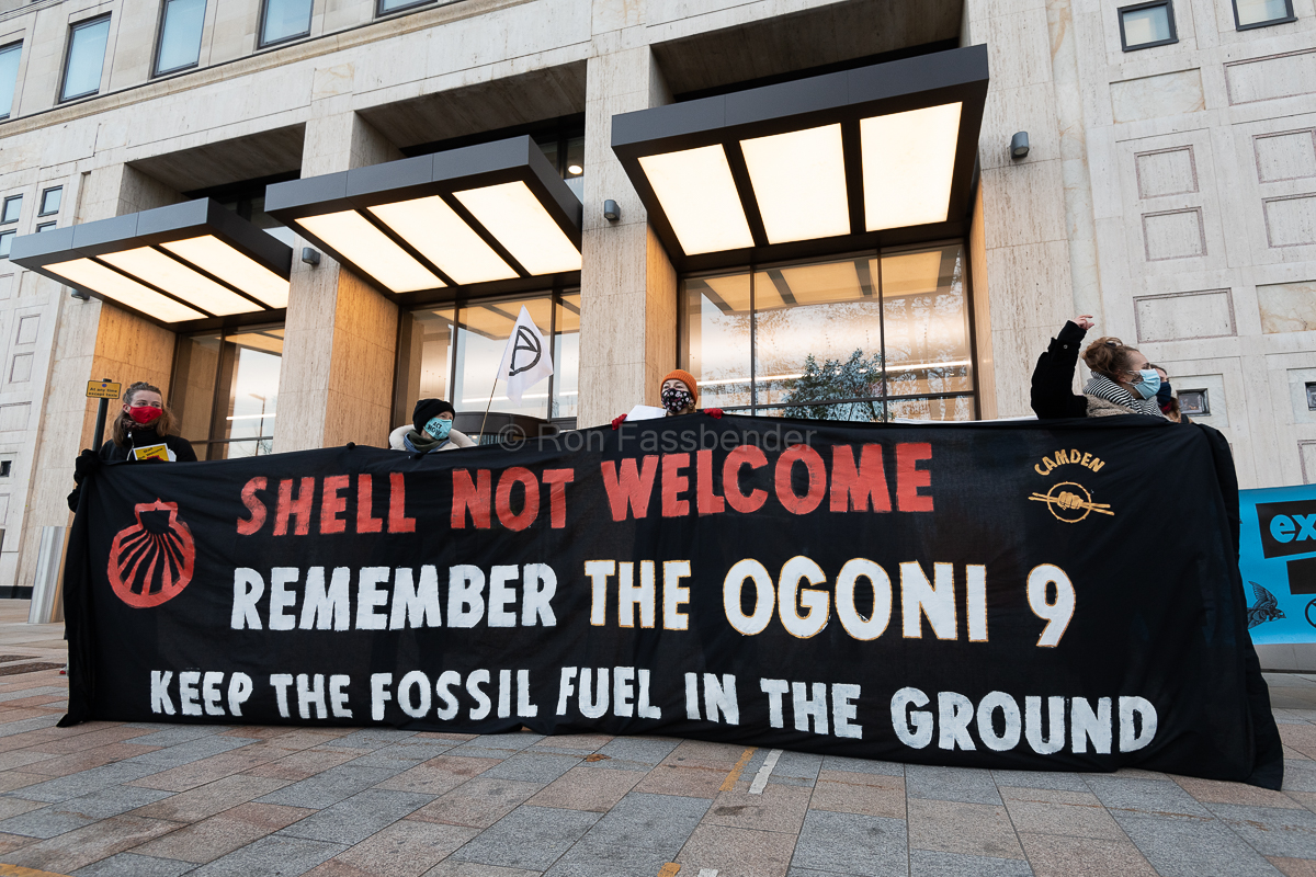 TheWeeklyBull's tweet photo. IMAGES: Shell Centre, London, 10/12/21. Activists from @fossilfreeLDN &amp; @XRLambeth hold an 'Unwelcome Party' as the Dutch oil giant @Shell votes on moving its HQ to London, following a court ruling it must cut C02 emissions. #ShellNotWelcome https://t.co/Jlm4IwmnUE