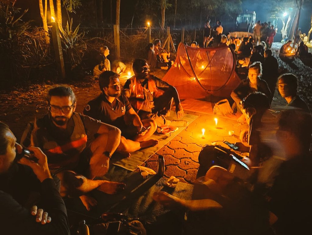 Gautham08428346's tweet photo. Peaceful late night gathering against the violent humans in Darkali forest in Auroville on 9th December night. You can see the bulldozer on the back that was used to destroy💔
#Auroville #istandwithauroville #aurovilleforunity #helpauroville https://t.co/oUGv9YhRL4