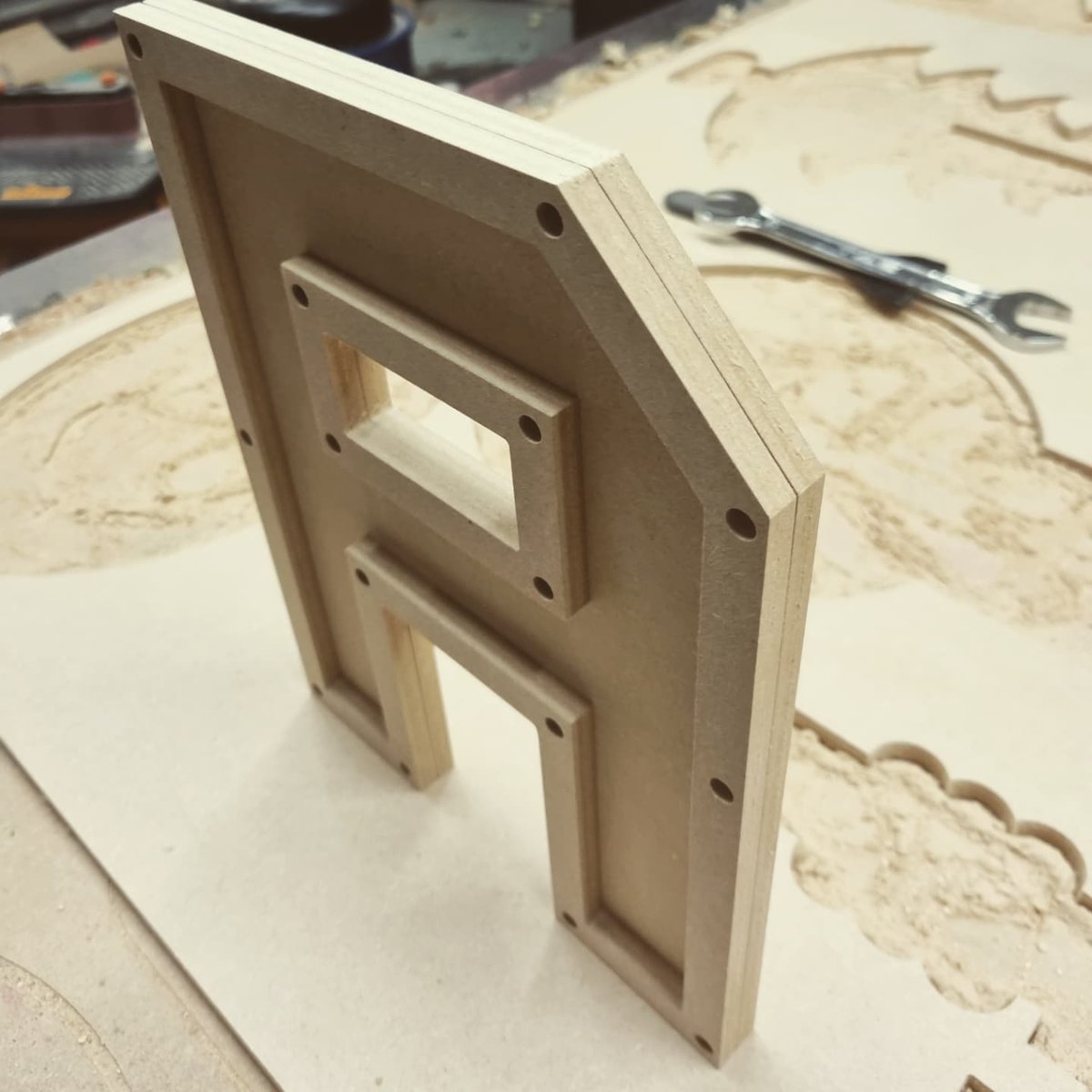 Thelasergeek's tweet photo. Prototyping some industrial style letters.  Thought they would look good with actual screws. 
Just some of the fun things I try to make on my CNC while streaming on twitch.  

#letters #sign #font #industrial #protype #maker #craft #style #twitch #cnc #screw #rivet #metal https://t.co/aj6LJAtlcy