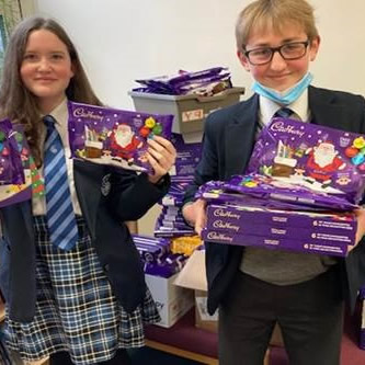 PurbeckSchool's tweet photo. Hope for Food appeal for Cadbury’s chocolate selection boxes is still ongoing. These boxes are being donated to children inside the Christmas food parcels, the Bournemouth charity delivers to struggling families. #CelectionBoxes #Charity #HopeforFood
https://t.co/b5Gf89KW7z https://t.co/ARAkye392V