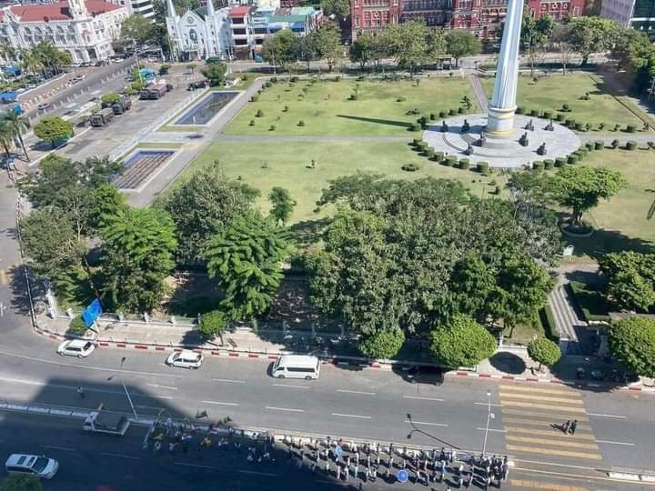 DVB_English's tweet photo. Legions of (roughly 50) pro-military supporters protested outside of Yangon City Hall today, in a counterbalance to the Silent Strike observed by tens of millions of people throughout Burma. https://t.co/y6wCoBBDWe