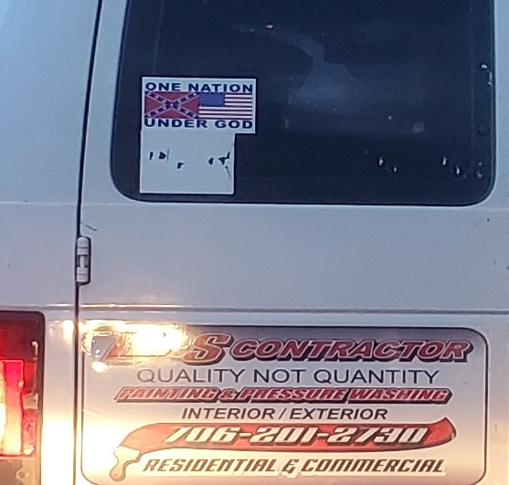 angrymoe's tweet photo. This "one nation" sticker has completely befuddled my brain.  I have no idea what message it is trying to convey. https://t.co/XMea4fZx7i