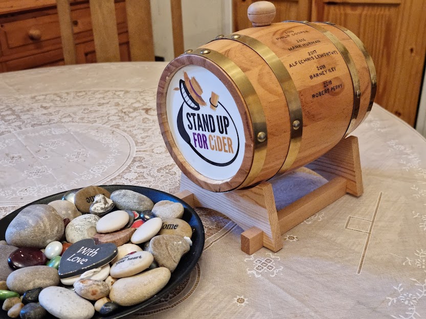GeniusSomerset's tweet photo. The FINAL of #standupforcider 2021 tonight! We are SOLD OUT (as usual)! Our trophy barrel will get a new name added...We are going to paint on that Covid won the 2020 heat! What a fantastic year for this competition! Roll on 2022! https://t.co/Wnvi4neu6Y