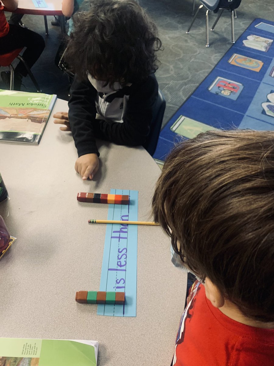 silvercityKCK's tweet photo. Practicing oracy with math vocabulary and application 🧮 “5 is less than 7.” That’s right! 5 school days left before Winter Break. Way to go Kindergarten! #lessthan #morethan #math♥️ #mathpartners #Eureka https://t.co/XDvu16p8pV