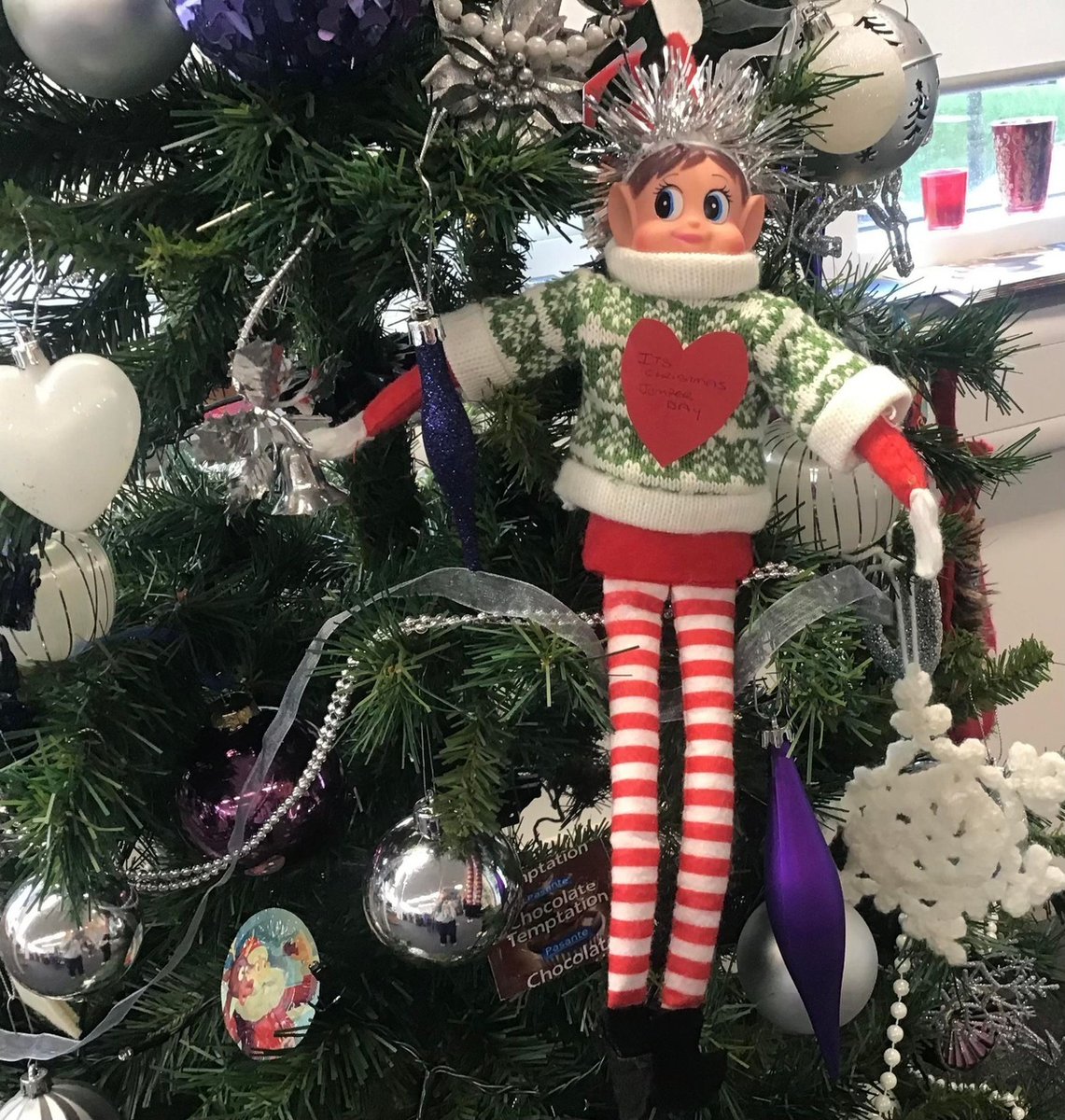 NCLCollege's tweet photo. We are supporting @savechildrenuk today with staff and students wearing their very best Christmas jumpers! Here are three of our Learning Mentors Ashley, Poppy and Georgia celebrating #ChristmasJumperDay with Ned the Office Elf! https://t.co/d58mfYZI2P