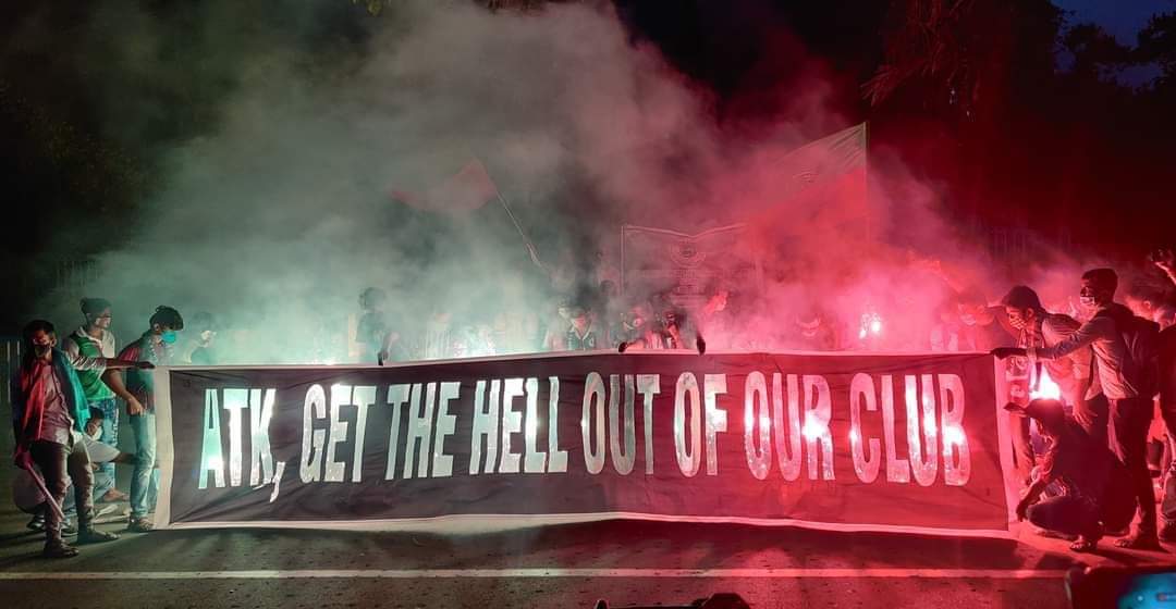 MohunNews's tweet photo. Enough is enough! These THUGS are dishonouring our @Mohun_Bagan's memories. Till @rpsggroup, @sanjivgoenka and @IndSuperLeague do not #BreakTheMerger and #RemoveATK from our sacred temple, the protest will only get fiercer! #atkMBisnotmyclub and never will be! https://t.co/XdQ3cDAG69