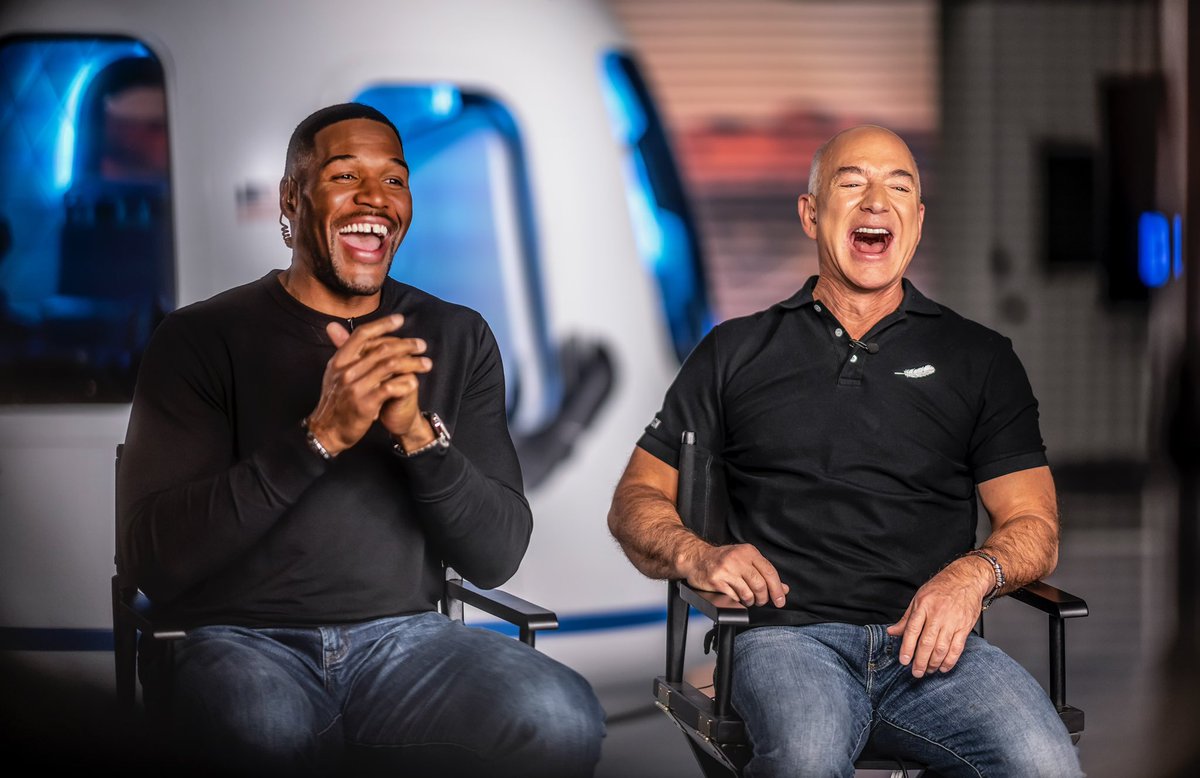 JeffBezos's tweet image. Loved being with @MichaelStrahan on Thursday Night Football. Gave him a little something to pack for his flight.