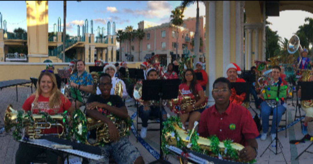 TUBA CHRISTMAS RETURNS on Sunday to Mizner Park Amphitheater. Friends and family are welcome to attend this free concert starting at 5 pm. Celebrate the holidays with the lowest instruments. Brings chairs, blankets, and be ready to sing along with many favorites.