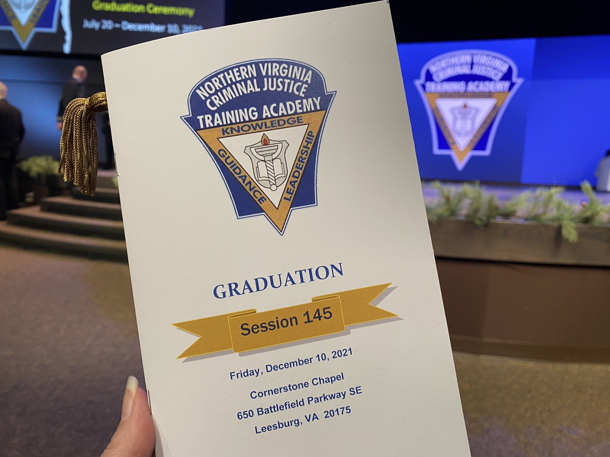 AlexVASheriff's tweet photo. Graduation of Session 145 Northern Virginia Criminal Justice Training Academy underway in Leesburg. APD Officer Bachman and ACPD Officer Chaco sing national anthem as session honor guard presents colors. https://t.co/eBMTTMg2cx