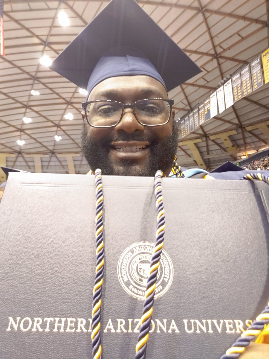 NadabbWarren's tweet photo. Just graduated with my Masters Degree! #NAUgrad https://t.co/UbWTKQvMUL