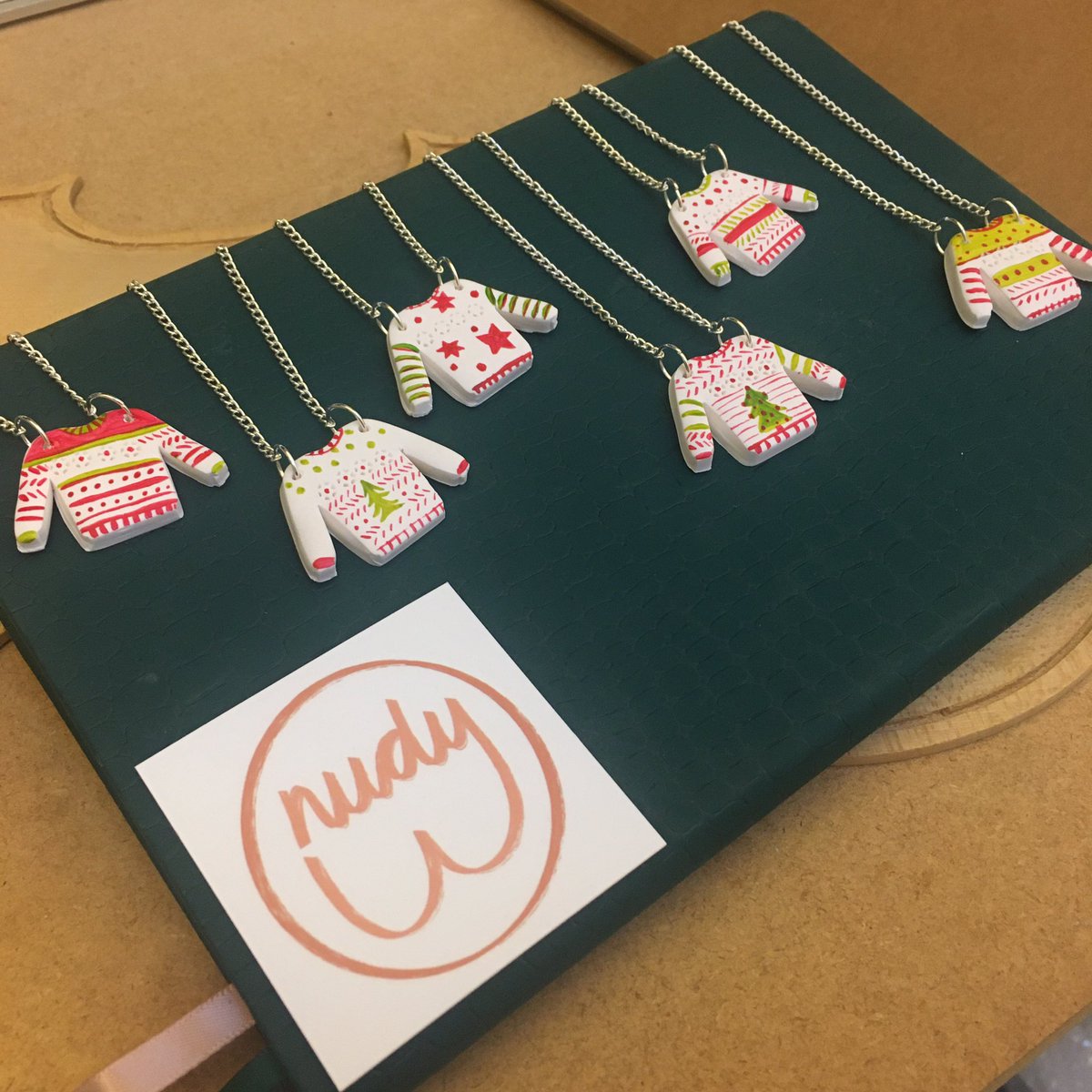 LucyVolpin's tweet photo. Happy #ChristmasJumperDay ! I’ve made a few clay christmas jumper necklaces to celebrate! Have a looky on my Etsy shop. Each one is individually hand painted and unique.

https://t.co/eu3ezuZKAt https://t.co/STovoXCsyE