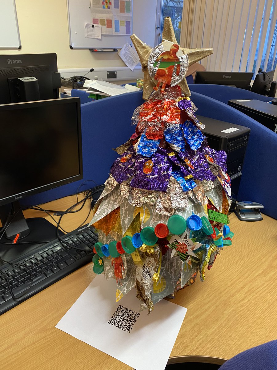 duncanmaciver's tweet photo. @chaplaincycccu are having a #merrycccu Christmas Tree competition. My lovely colleagues in @CCCU_LTE @CCCUTEL have put together our entry, the "Sustainabili-tree". All decorations made by recycling food wrappers etc. Please vote for it by scanning the QR code. @canterburyccuni https://t.co/4OYXEGEGEz