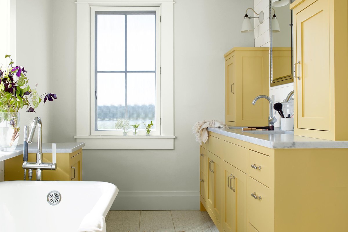 Bathroom woodwork can be stunning with the right color choice. Marblehead Gold HC-11 is magnificent against White Heron OC-57 on the ceiling and trim. Reach out to us for your next paint project. #benjaminmoore #benjaminmoorecolors