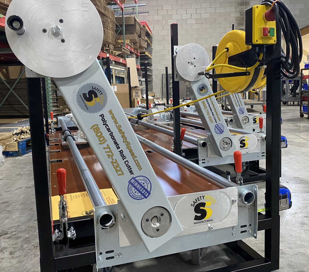 A few plastic processing plants will be reducing their yield to scrap ratio when cutting thousand-pound rolls of polycarbonate. This machine safely cuts polycarbonate with a circular saw while eliminating the need for a person on the ground, inches away from a circular saw