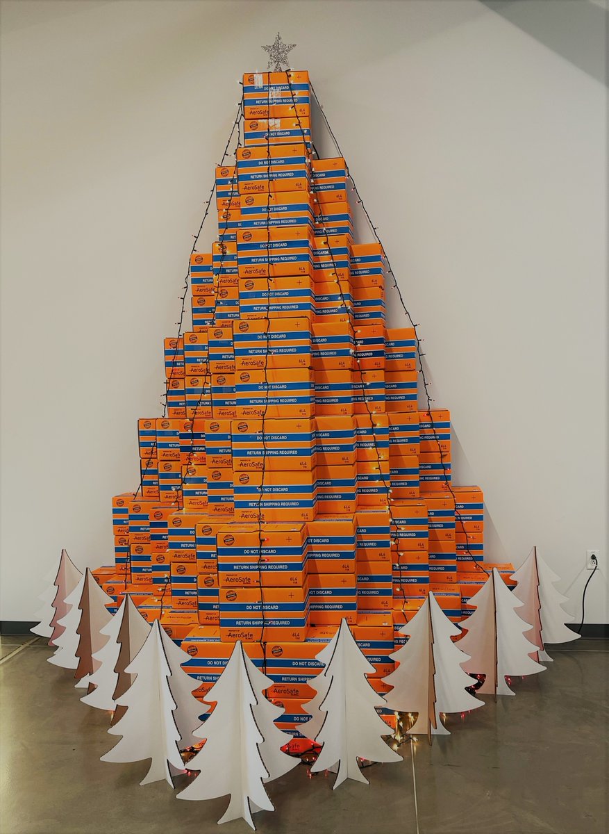 AeroSafeGlobal's tweet photo. The legendary @GeneseeBrewery and its festive #kegtree inspired the @AeroSafeGlobal team to think outside of the #coolorangebox and craft the first-ever cold chain #boxtree right in our lobby. #ROC #rochester #lifechangers https://t.co/UqtY9cXizN