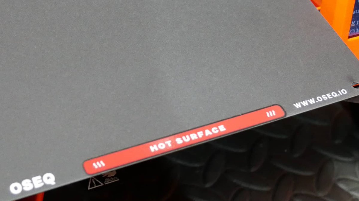 de3dprintman's tweet photo. This is the @OSEQ_3D #SafeSheet for the #PrusaMINI. This velvet soft double sided sheet is coated with a high quality ULTEM or PEI powder. It feels extremely soft and is very thin. That little strip in the front turns red when the bed is heated for extra safety. #Oseq #PrusaMINI https://t.co/9FufFD6aBi