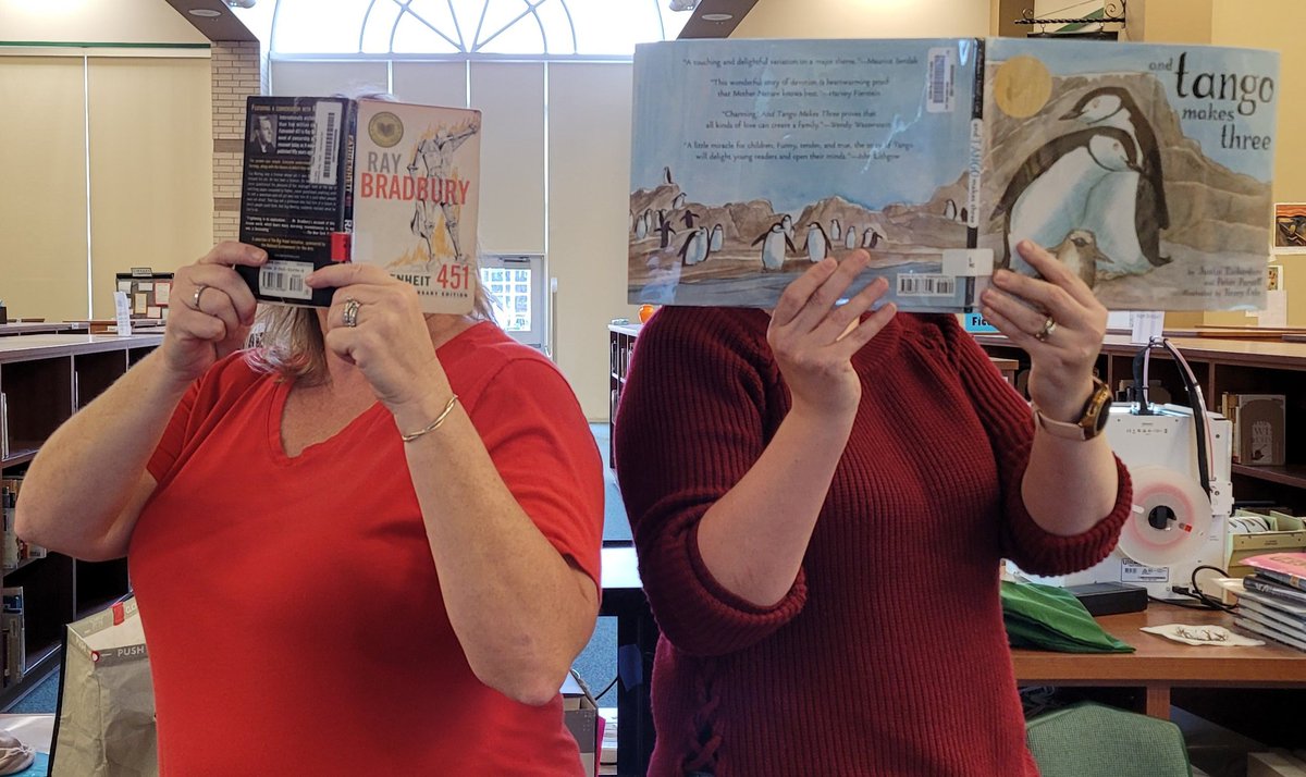 CFHS_Library's tweet photo. We are wearing #RedforRead and supporting our students' #FReadom to read books that reflect the diversity of our community. #KnightsRead #uKnighted https://t.co/zBYyaYjkQs