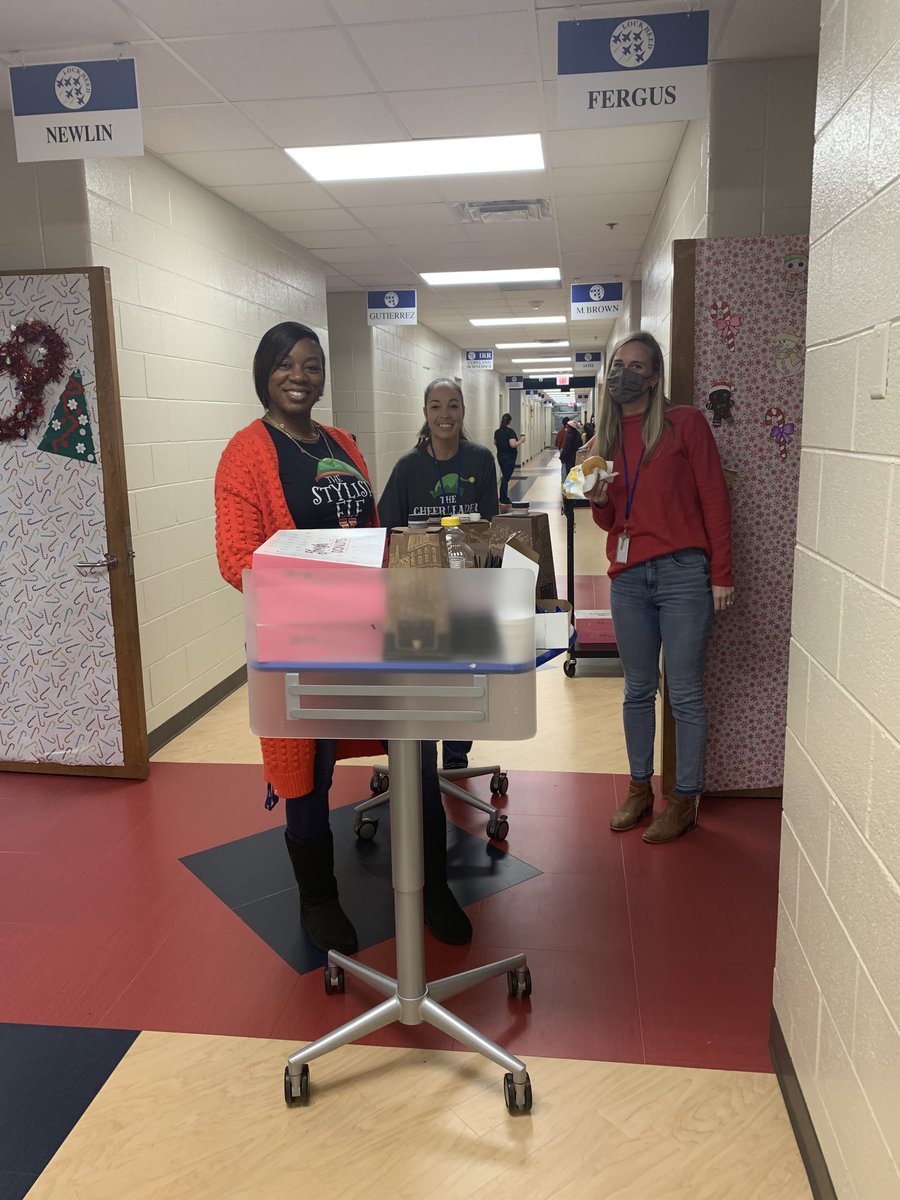 LockheedElem's tweet photo. Our admin team went door to door with the Jolley Trolley today to spread some holiday cheer through coffee, donuts, juice, and other treats! #DashingThroughDecember https://t.co/70BRqOOC7v