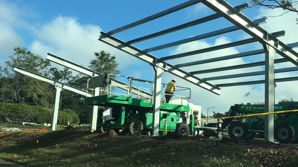 Canopy for solar electric panels going up today at #Fairhope city hall.