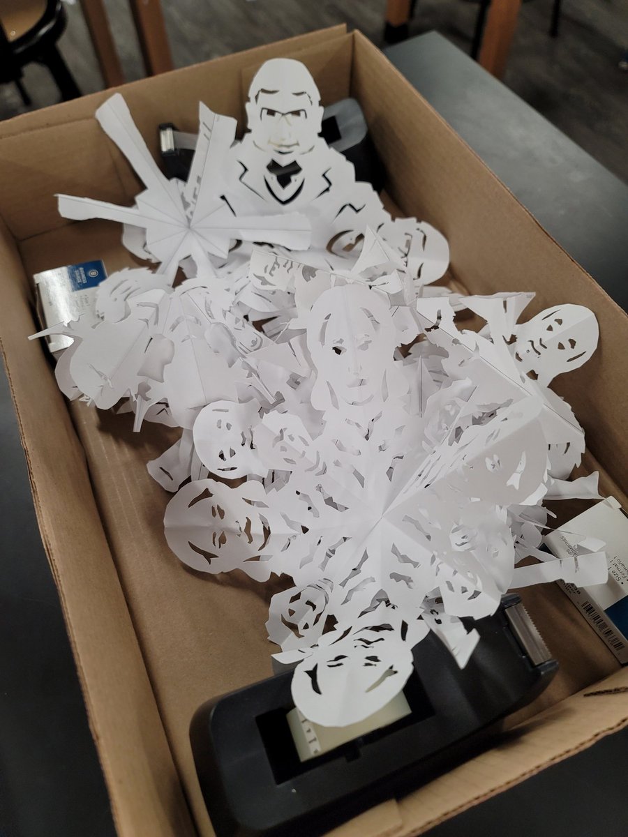 My physics students are spreading cheer.  Scientist and equipment snowflakes!!!