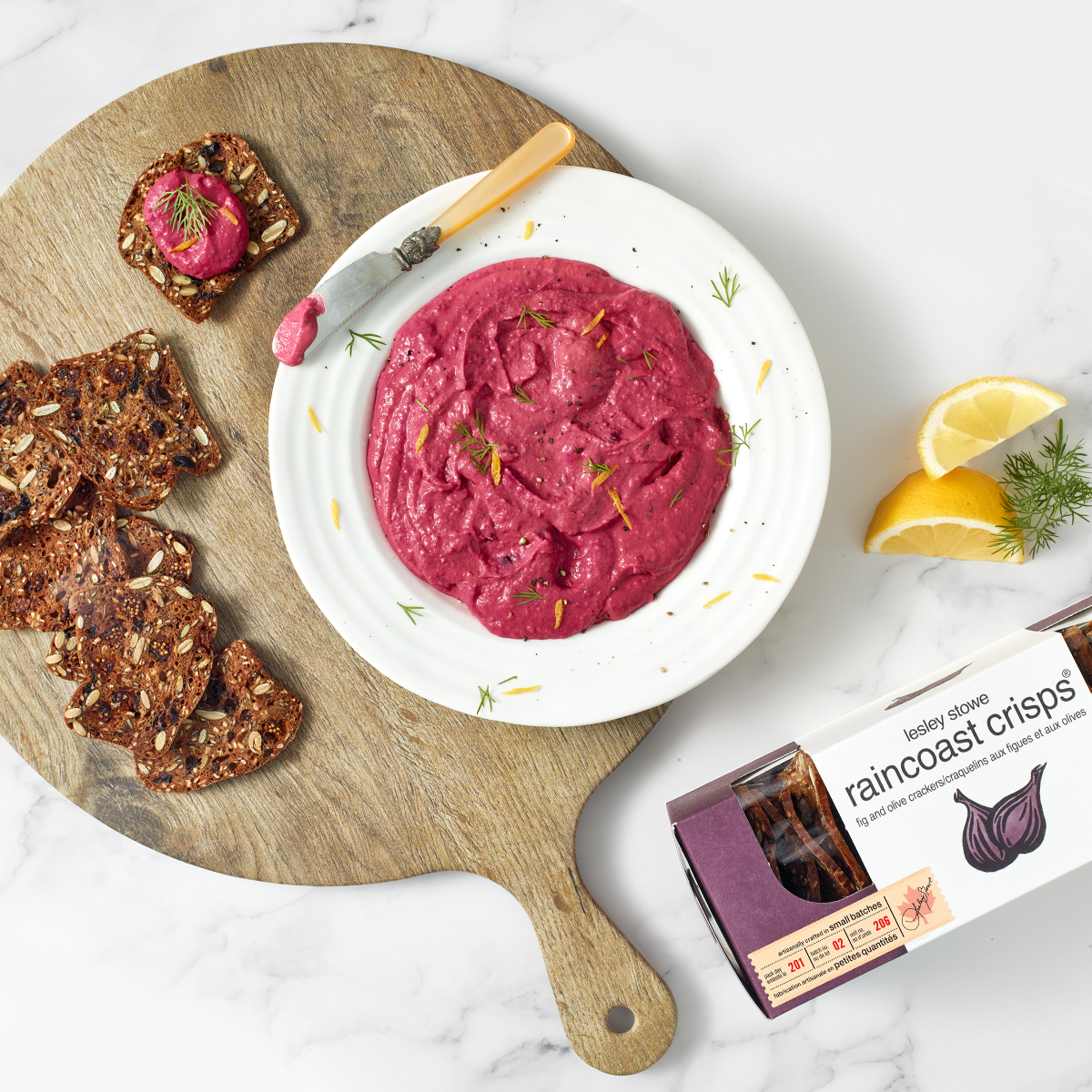 With its festive colour take your appetizer up a notch with our roasted beet hummus that can be paired with our fig and olive raincoast crisps®. #ourcraftyourart #raincoastcrisps #crispyconversation